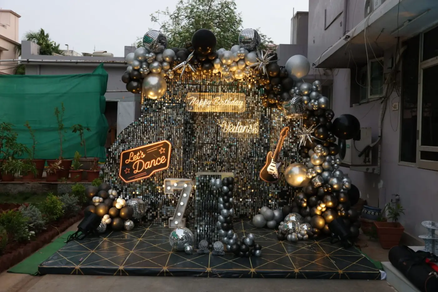 Full disco birthday setup at a private residence in Guntur